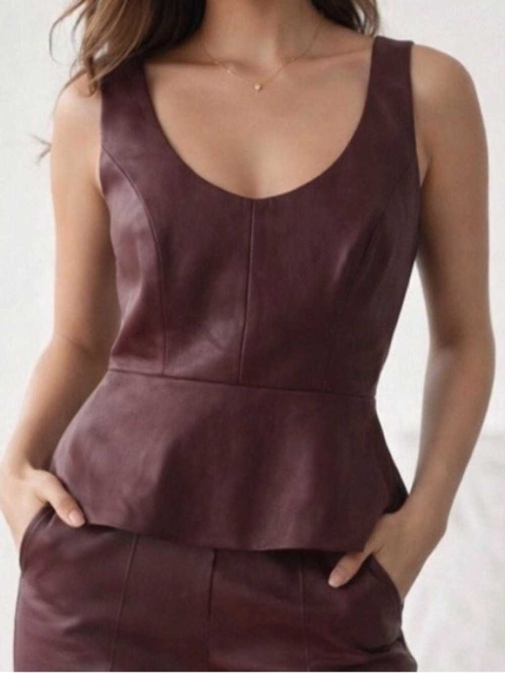 NWT BCBG MaxAzria XS  Cladiana vegan leather peplum top in Royal Port red